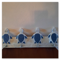 Appendini con tartarughe blu