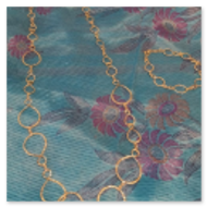 Collana lunga con anelli irregolari e bracciale