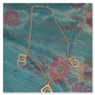 Girocollo con rombi in silver e ottone riciclato