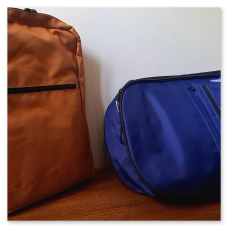 Zaino con doppia cerniera blu e zaino arancione